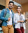 Two young adults walking to class