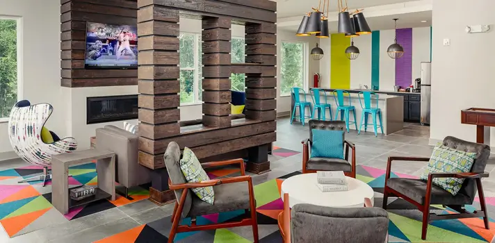 Interior lounge featuring a entertainment center and fire place